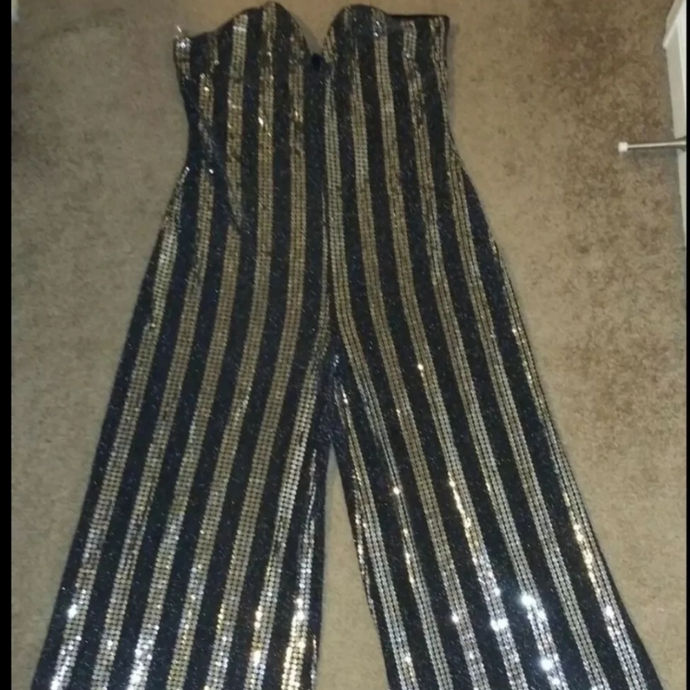 Woman's black & silver jumpsuit Sz 16 New